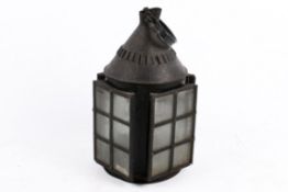A late 19th early 20th century candle lantern.