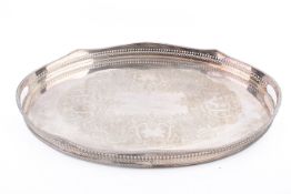 A large oval silver plated tray.