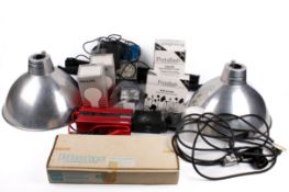 Collection of assorted camera and film equipment. Including a Nikon Speedlight SB-16 flash, etc.