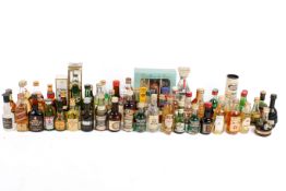 A large collection of assorted bottles of alcohol miniatures. Including whisky, etc.