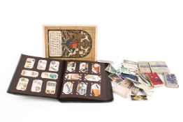 A collection of assorted cigarette trading cards, etc.