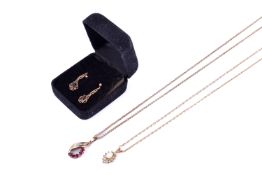 Two pendants with 9ct gold necklaces and pair of earrings.