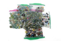 A large collection of assorted 20th century glass marbles, various sizes.