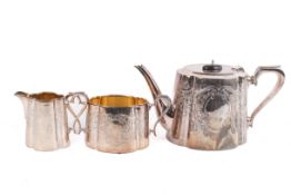 Three piece silver plated tea set. Consisting of a tea pot, milk jug and suagr bowl.