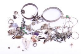 A small group of silver and white metal jewellery and a pair of 9ct earrings.