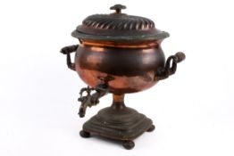 A Victorian copper samovar and cover.
