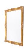 A contemporary decorative gilt framed wall mirror. Having rectangular bevel edge plate.