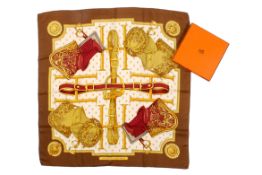 A Hermes Selles A Housse red, white and gold silk scarf in original box.