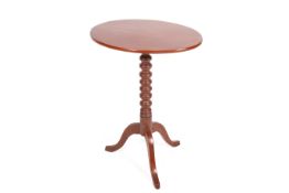 A Victorian mahogany tilt top wine table.