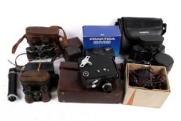 Collection of assorted vintage film cameras and binoculars.