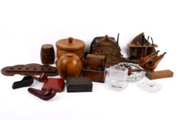A collection of assorted smoking ephemera. Including pipes, tabacco jars and ash trays, etc.