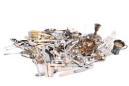 A collection of assorted silver plated items, in a tin box.