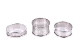 Three hallmarked silver napkin rings.
