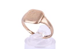 A 9ct gold signet ring. With rubbed engraved monogram, size R, weight 3g.