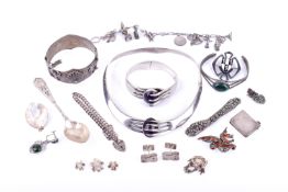 A group of silver jewellery.