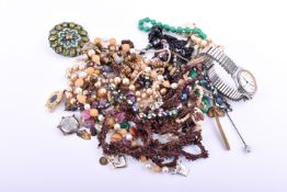A small bag of costume jewellery.