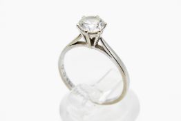An 18ct white gold and synthetic diamond solitaire ring.