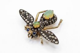 An articulated brooch in the form of a bee.