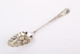 A George III silver berry spoon.