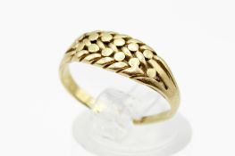 An 18ct gold keeper style ring. Hallmarked, misshapen. Gross weight 3.6g.