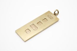 A rectangular 9ct gold ingot pendant. Hallmarks for London 1976, 5.2cm x 1.