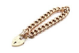 A rose gold curb link bracelet.