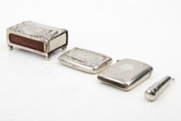 Four late 19th and early 20th century silver smoking related items.