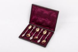 A set of six Victorian gilt silver teaspoons.