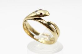 An 18ct gold late Victorian snake head ring. Set with one old cut diamond of 2.