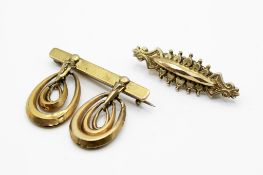 Two 9ct gold brooches.