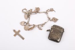 A small group of silver and white metal items.