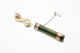 Two 9ct gold bar brooches.