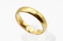 A 22ct gold wedding band. Width 3.5mm, hallmarked, size L, weight 4.9h.