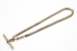 A yellow metal snake link Albert chain.