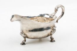 A George II silver sauce boat.
