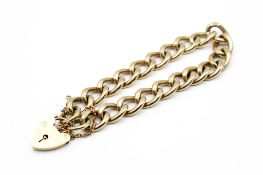 A hallmarked 9ct gold filed curb link bracelet.