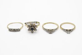 Three 18ct rings and one with rubbed marks.