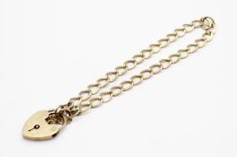 A 9ct gold link bracelet. Hallmarked, with hallmarked heart locket, security chain, gross weight 5g.