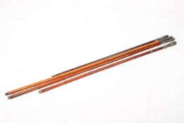 Four contemporary silver mounted walking canes.