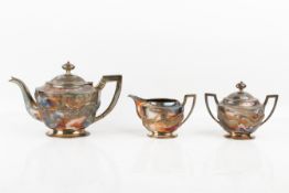 An early 20th century three-piece silver Chinese Tack Hing tea set.