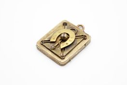 A rectangular hinged picture locket with equestrian motif.