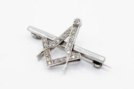 A handmade 18ct white gold (tested) brooch of Masonic theme.