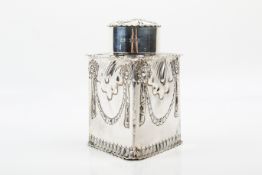 A Victorian triangular form silver tea caddy and lid.