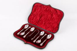 A set of six Victorian silver teaspoons and sugar tongs.