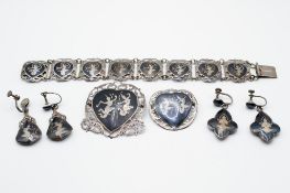 A group of Siamese silver jewellery.