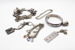 A small group of silver and white metal jewellery.