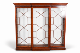 A very large Edwardian mahogany breakfront cabinet.