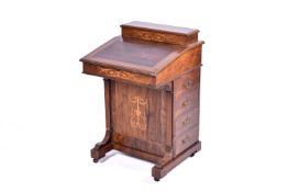 A 19th Century rosewood Davenport desk.