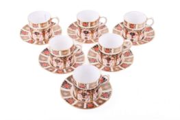 A set of six Royal Crown Derby cups and saucers. In the Imari pattern 1128, saucer diameter 11.2cm.