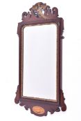 A 19th century inlaid mahogany wall mirror.